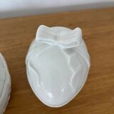 Pair of porcelain egg-shaped pocket trays