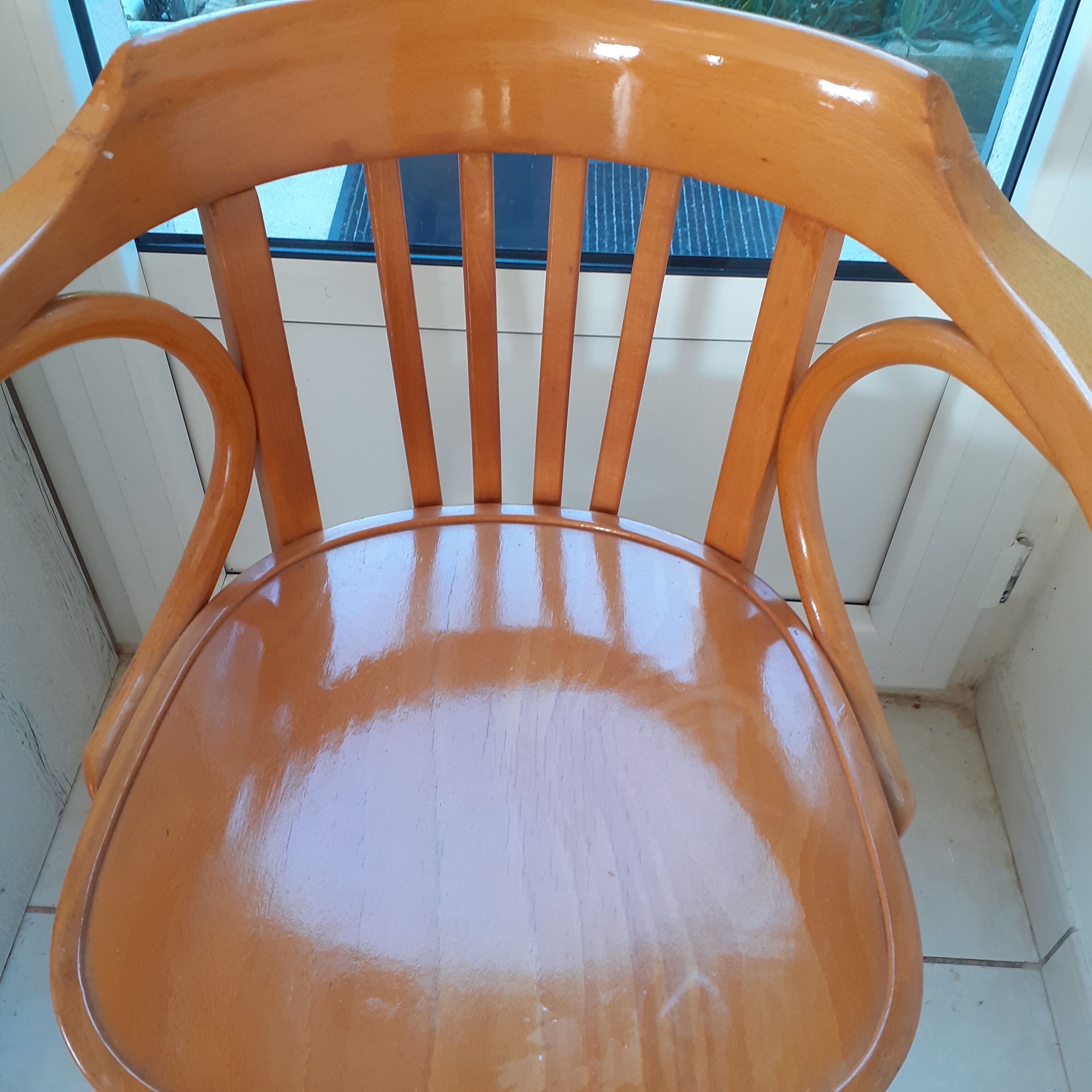 Baumann armchair in light beech. With its label.