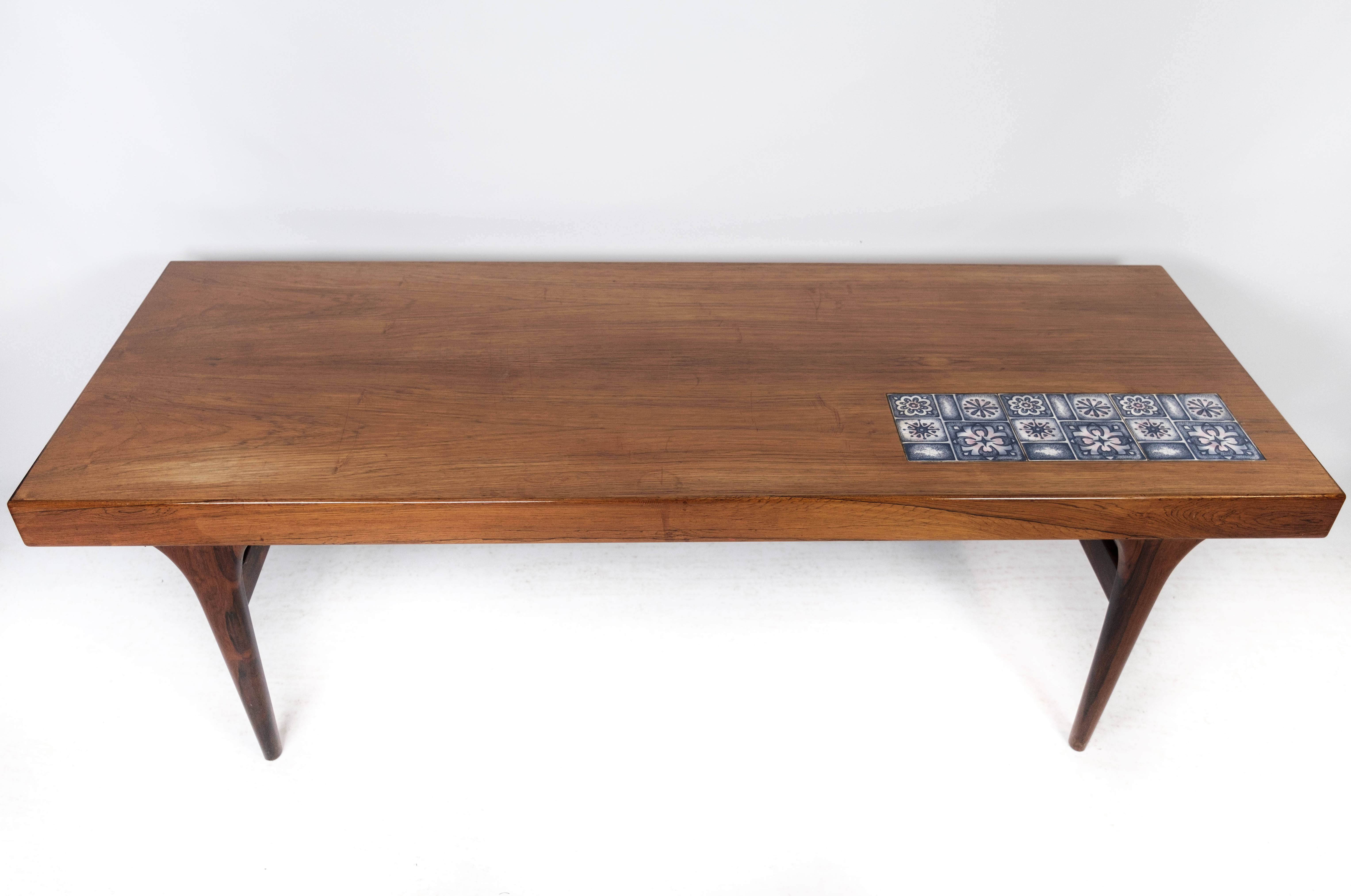 Coffee table in rosewood with blue tiles designed by Johannes Andersen, 1960s