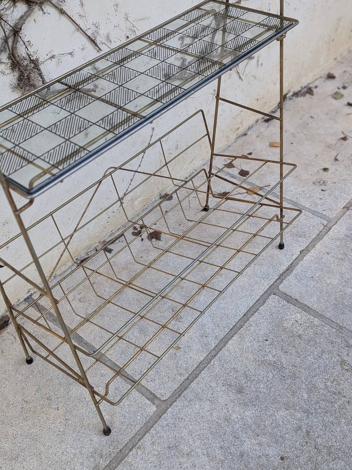 Gold metal magazine rack