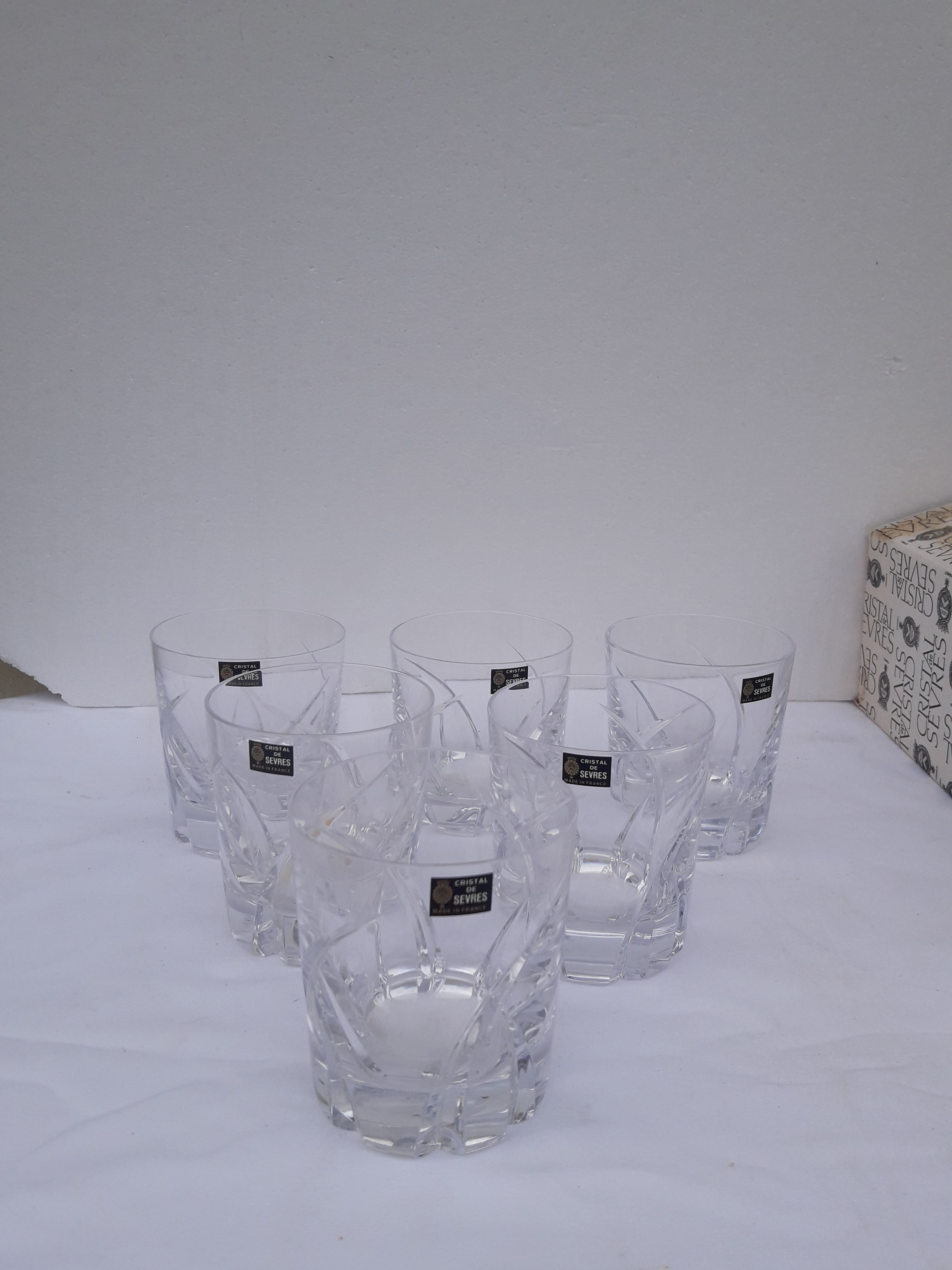 6 whiskey glasses and 6 orange glasses stamped Crystal of Sèvres model Monge