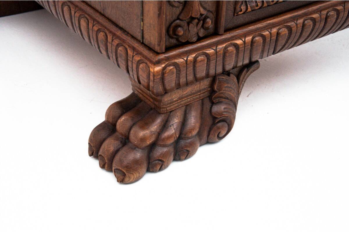 Cabinet set on lion's paws, Germany, early 20th century.