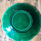 Plate with botanical leaves in green enameled earthenware from Clairfontaine circa 1890