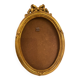 Golden oval wooden frame