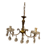 Golden brass chandelier and glass