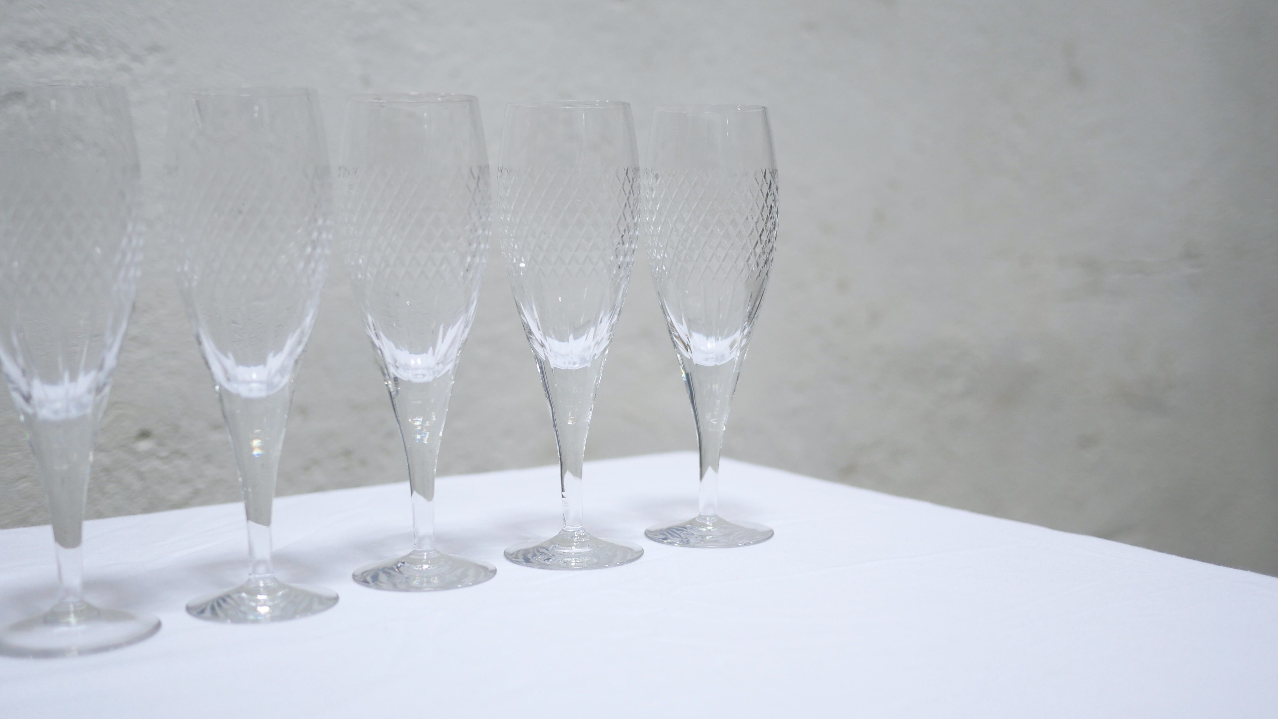 Series of 10 vintage crystal champagne flutes