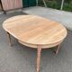 Table à manger ronde extensible Louis Philippe décapée en merisier massif 1