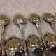 12 gold-plated metal moka spoons with Russian-style handles, 10.6 cm