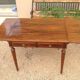 Louis XVI style table in rosewood with lemon tree inlay.