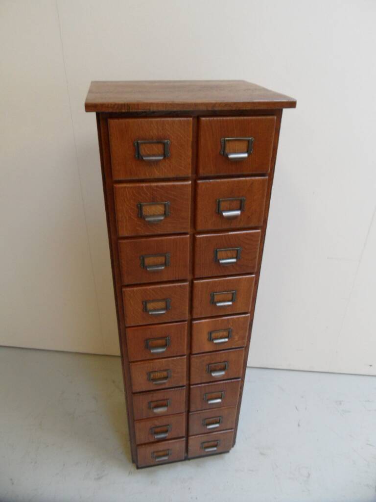 Antique oak apothecary cabinet with drawers