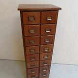 Antique oak apothecary cabinet with drawers