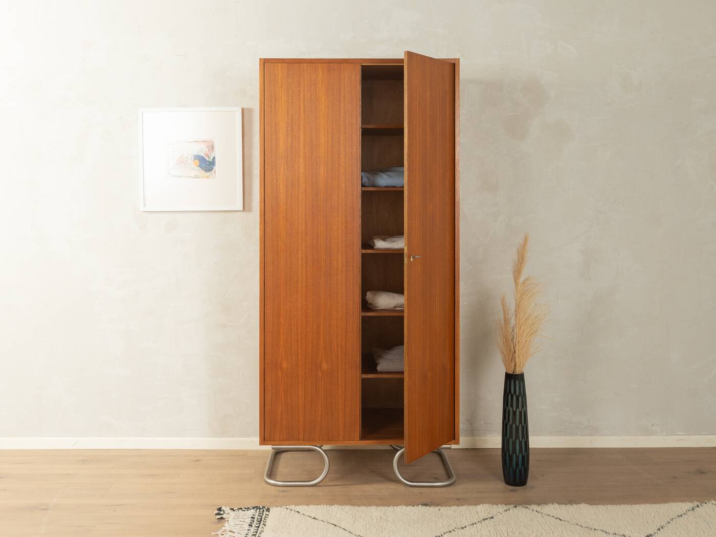 Purist wardrobe from the 1960s in teak veneer by DeWe