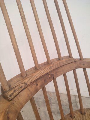 Rocking brutalist chair in oak, France, 1920s