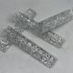 12 knife holders in cut crystal triangular shape
