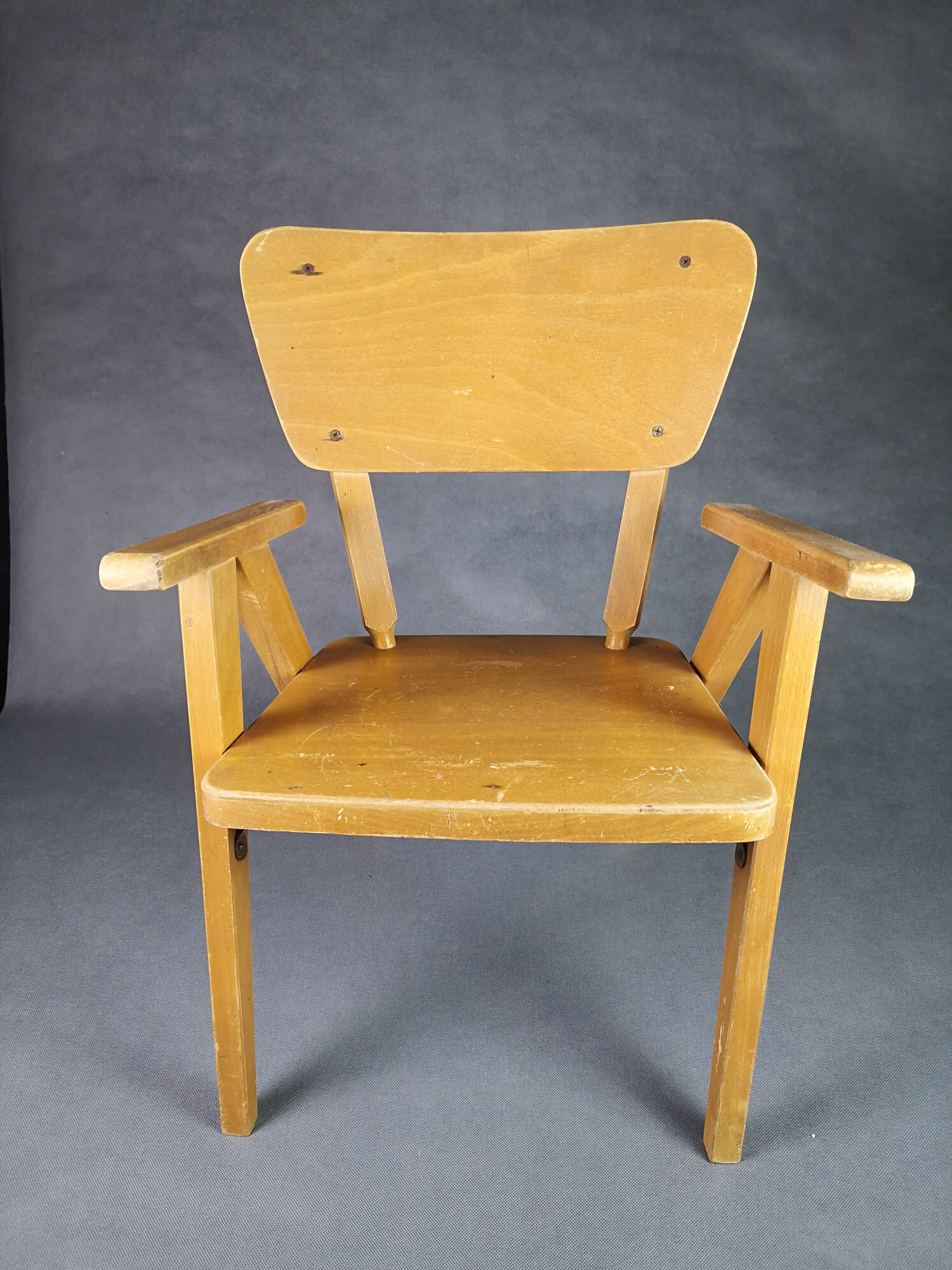 Vintage armchair child feet compass light wood