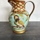 Pichet barbotine 19th century with bird decoration.