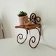 Antique wrought iron wall shelf