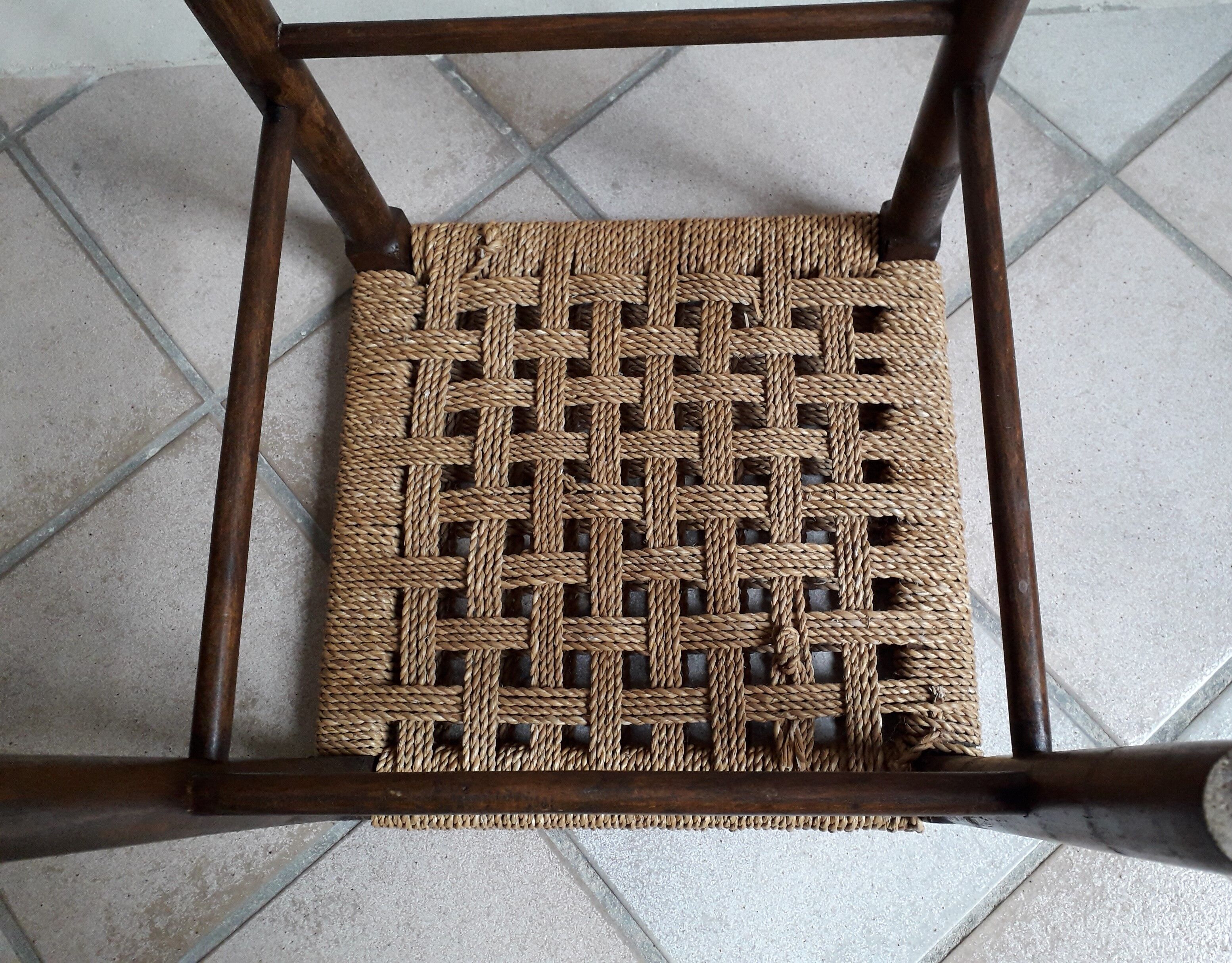 Wooden stool and rope