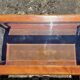 Coffee table in cherry wood, glass and caning.