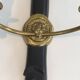 Pair of black lacquered bronze wall sconces decorated with lion heads