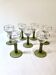 7 Alsace Roemer wine glasses, moss green stepped bases and gold trim.