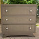 Wooden art deco chest of drawers