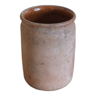 Old grease or honey pot in ochre glazed earth