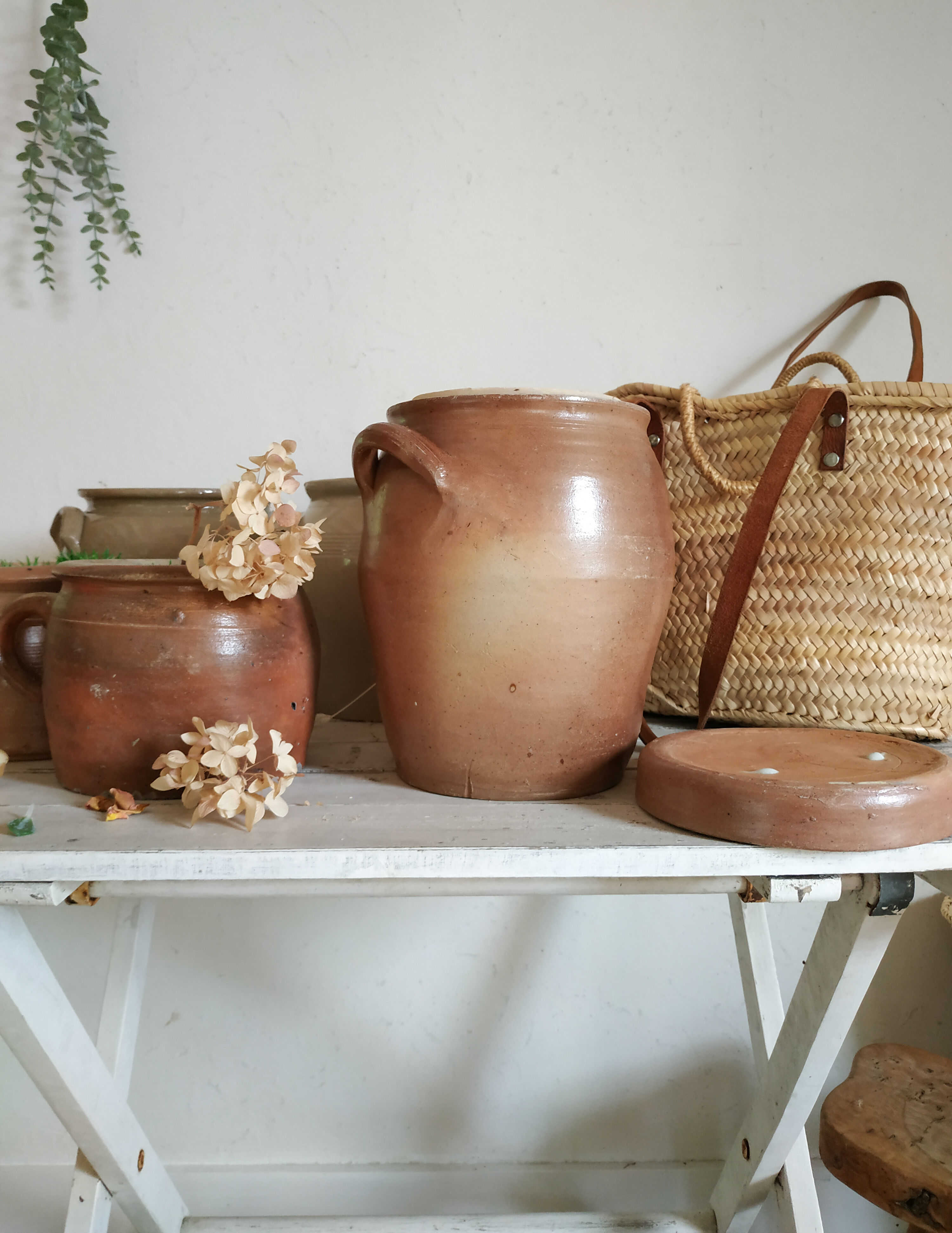 Old terracotta pot with lid