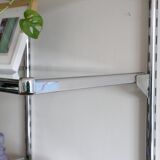 Chrome and glass wall shelf, circa 1960