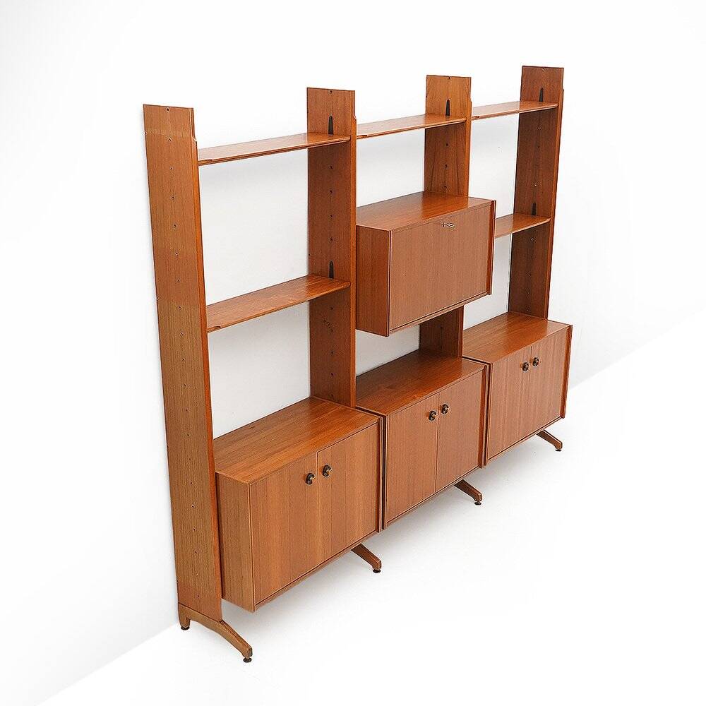Library with wooden uprights by A.V. Contemporary Furnishings, 1960s.