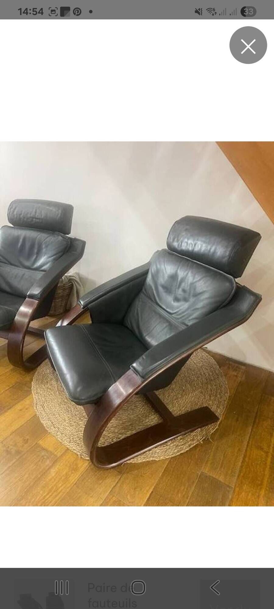 Pair of Scandinavian armchairs with a footrest from the brand NELO.