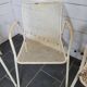 4 perforated metal garden armchairs