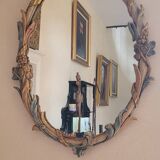 Mirror and its carved wooden sconces