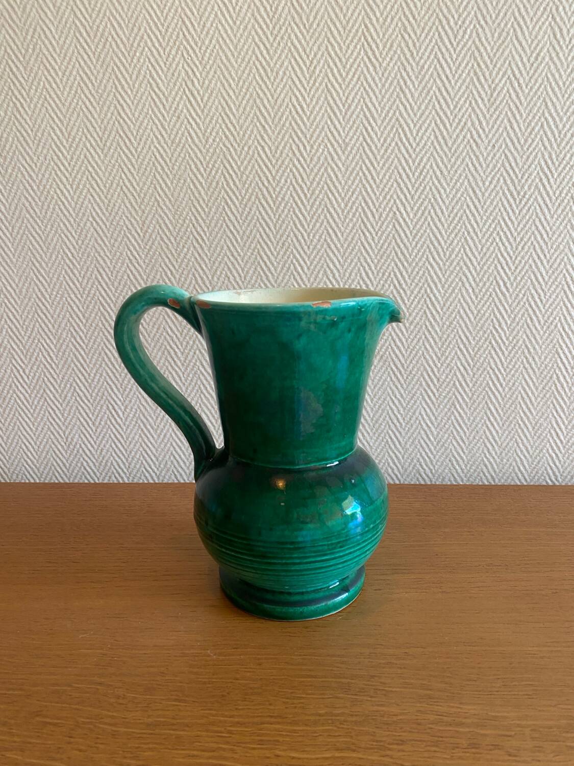 Green glazed ceramic carafe