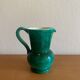 Green glazed ceramic carafe