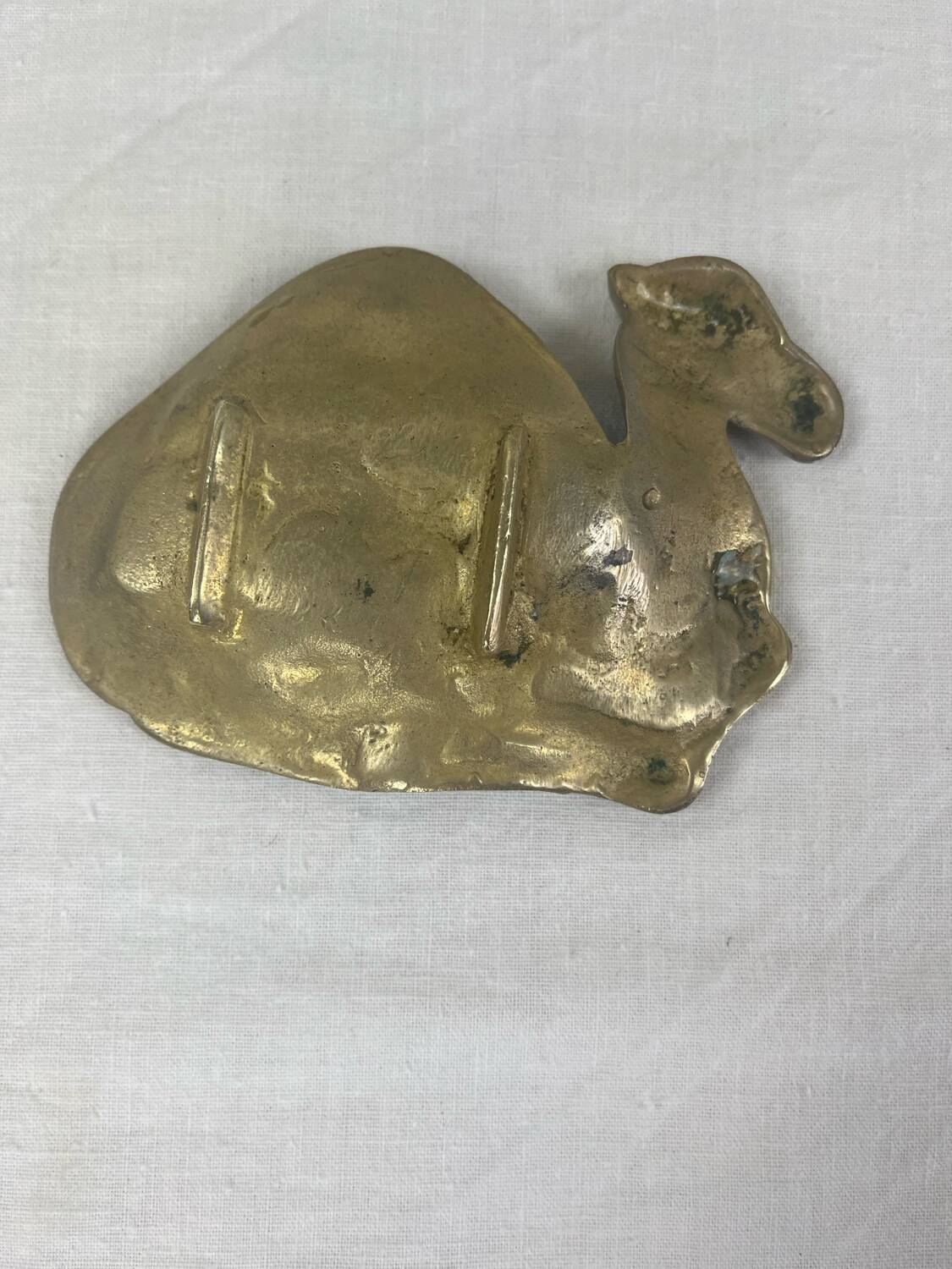 Brass pocket emptier