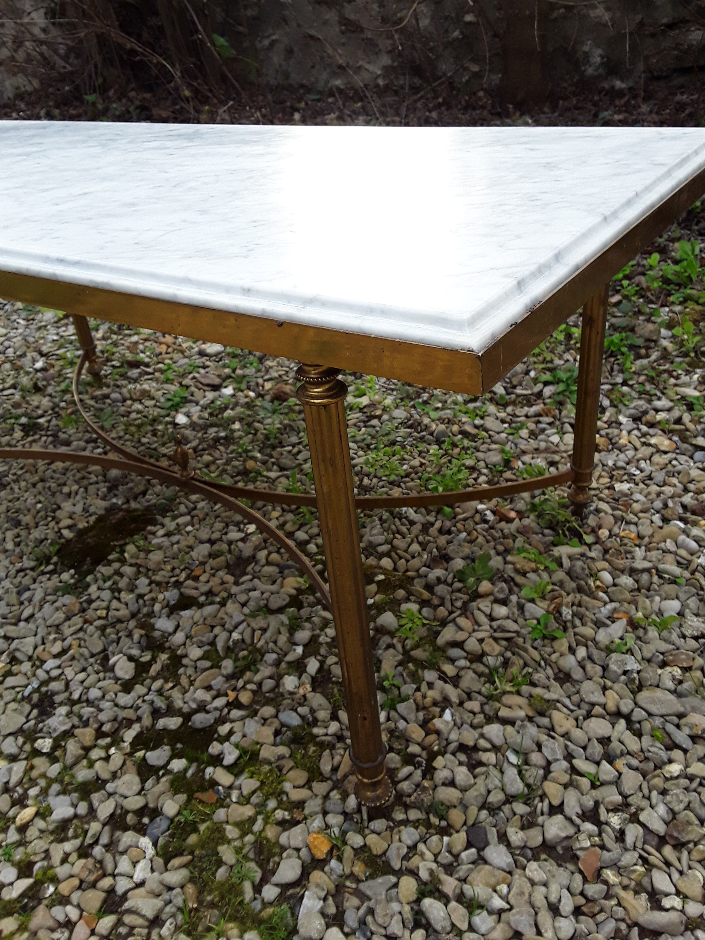 Marble coffee table and gilded brass