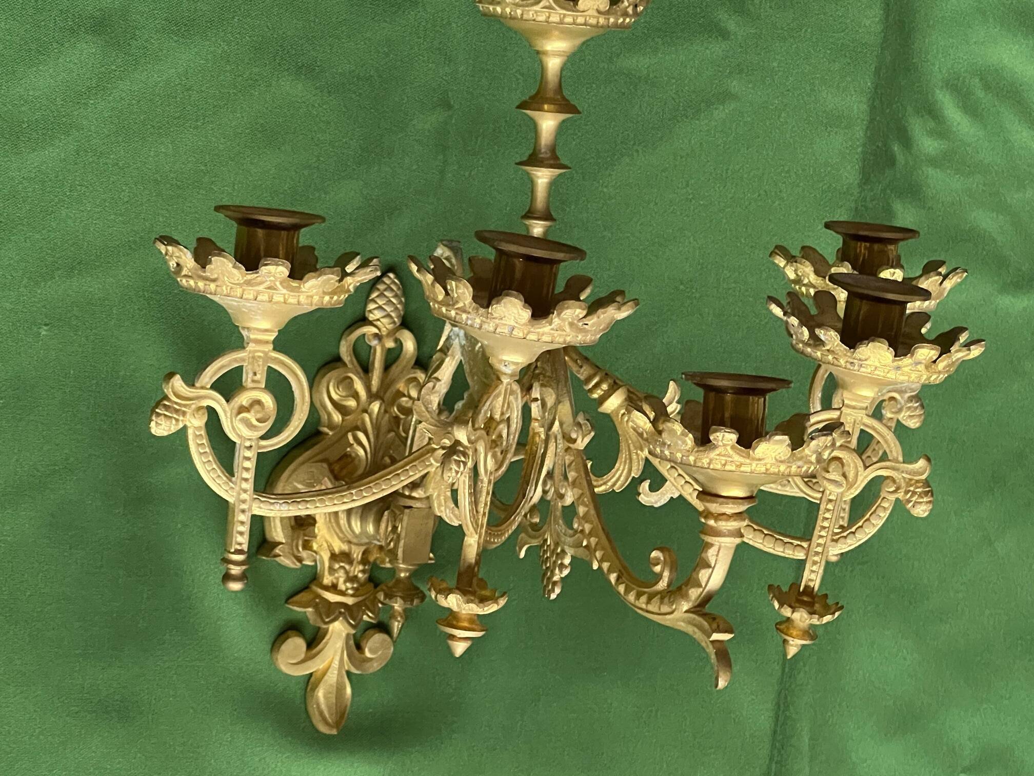Pair of neo-Gothic wall sconces. Solid gilt bronze.