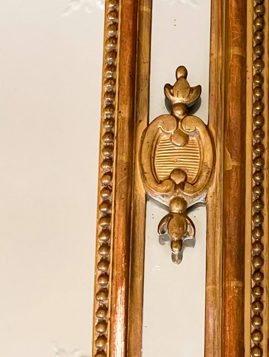 Large wooden and gilded stucco mirror with parecloses - 19th century