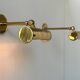 Pair of vintage adjustable wall lights, solid brass, France 1950