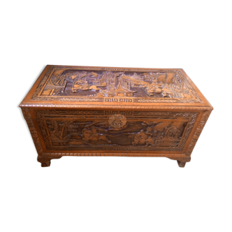 Indochinese chest in carved camphor tree