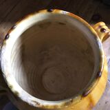 Old yellow pot varnished with confit from the Southwest