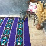 Romanian rug handwoven in wool, purple background with red and yellow stripes
