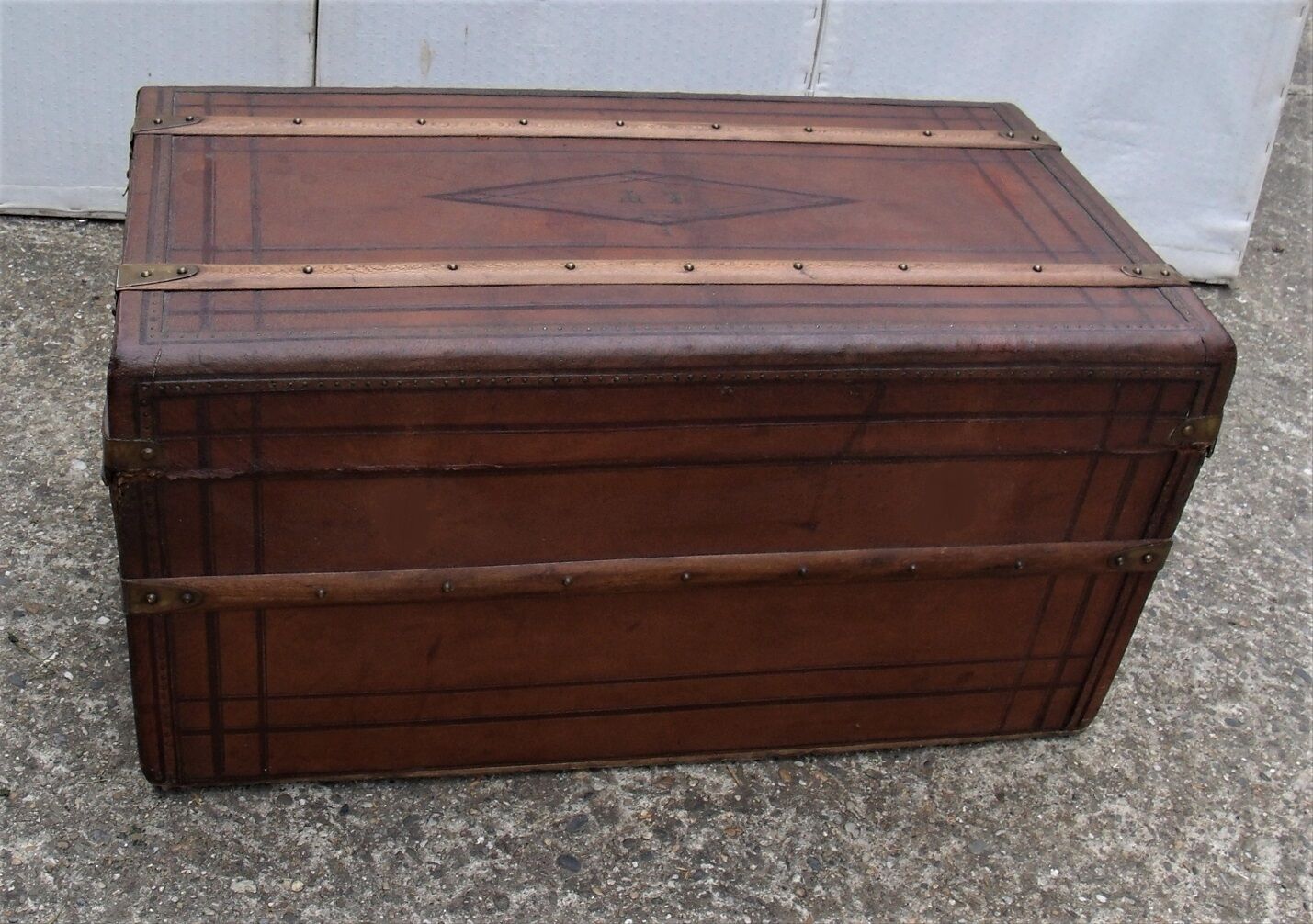 Old wooden trunk covered leather travel chest