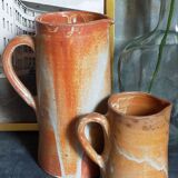 Duo of vintage glazed stoneware potter's pitchers