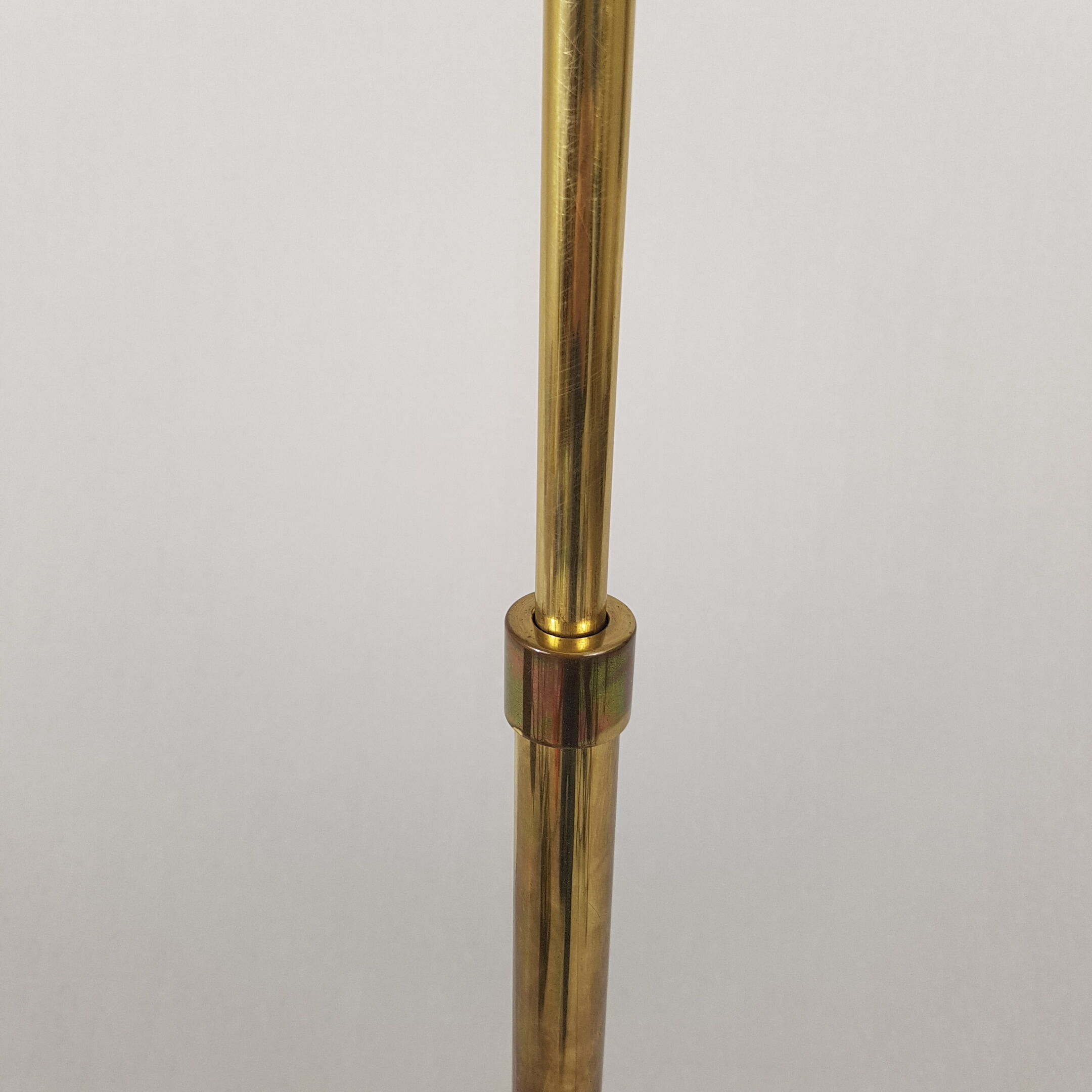 Articulated brass floor lamp