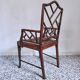 Fauteuil asiatique canné en bois à l'imitation du bambou