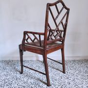 Asian canine armchair in wood in imitation of bamboo