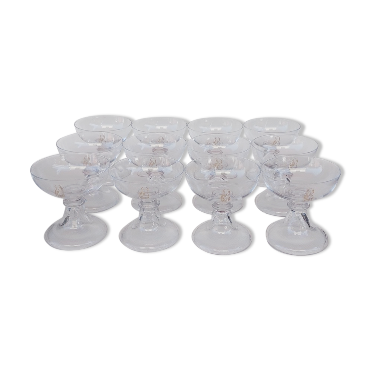 12 Val Saint Lambert crystal champagne glasses. Plain Bell Foot Service. Late 19th century.