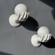 Pair of opaline and ceramic hand sconces
